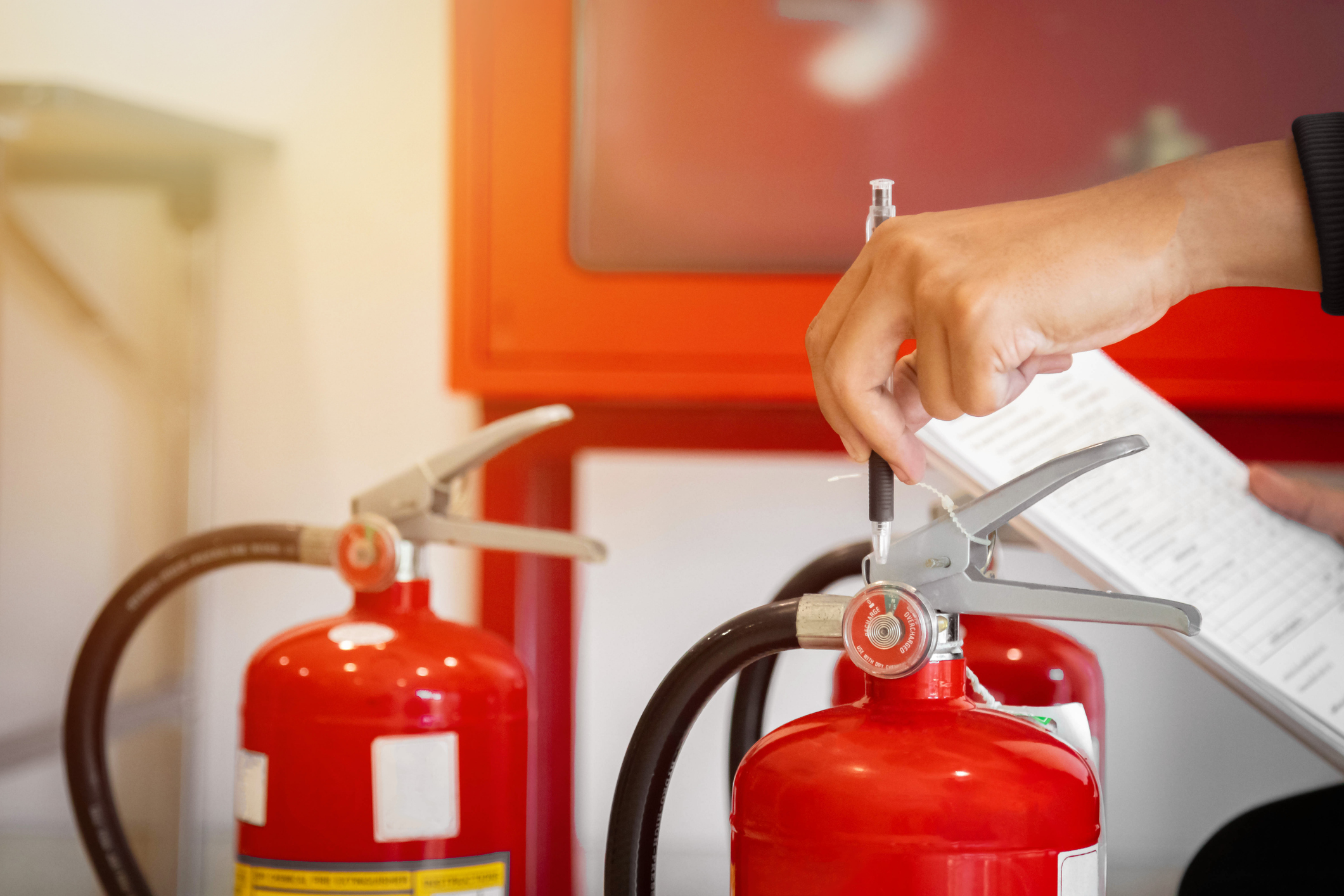 Engineer check fire suppression system,check fire extinguisher tank in the fire control room for safety Fire extinguisher inspection and tagging